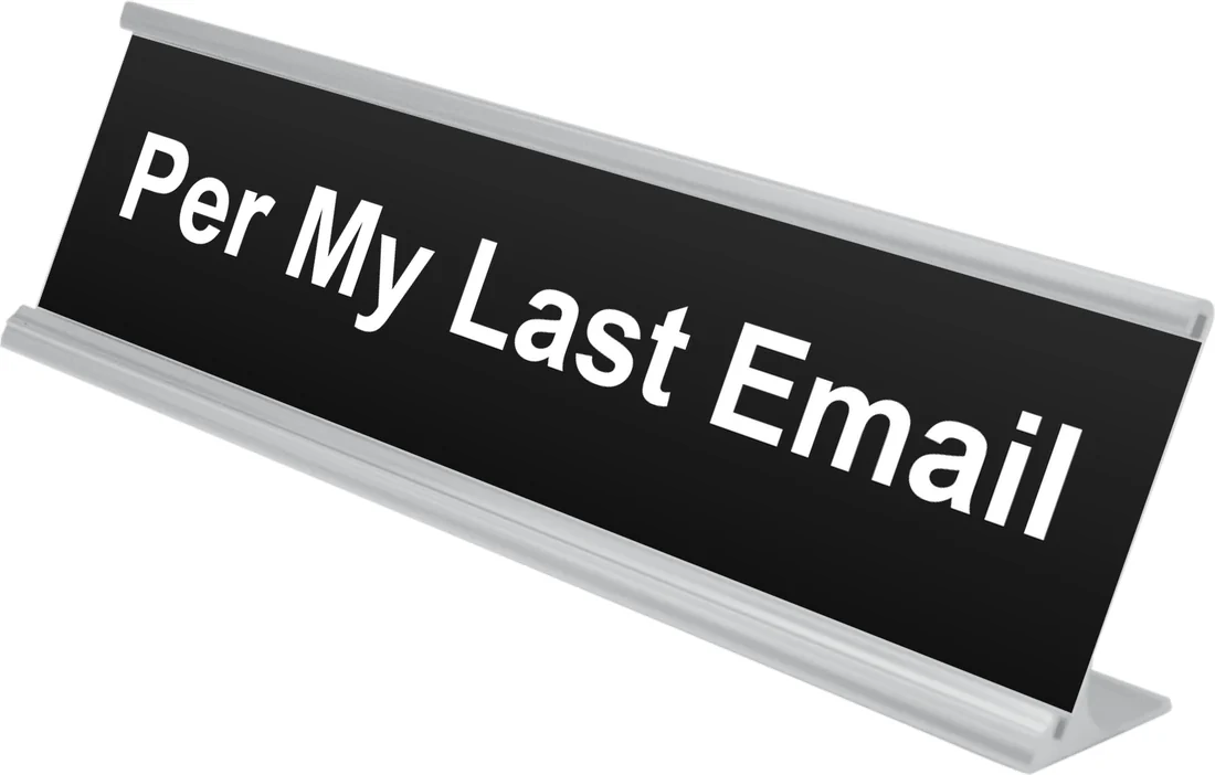 Per My Last Email desk plate in black, shown in an aluminum desk holder