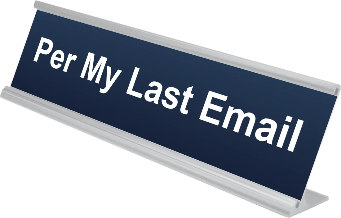 Per My Last Email desk plate in navy, shown in an aluminum desk holder